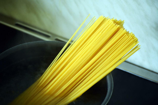 Prepare the vegetables while the spaghetti is cooking.