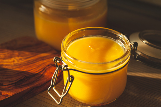 Butter is melted to separate the fat from milk solids, resulting in ghee.