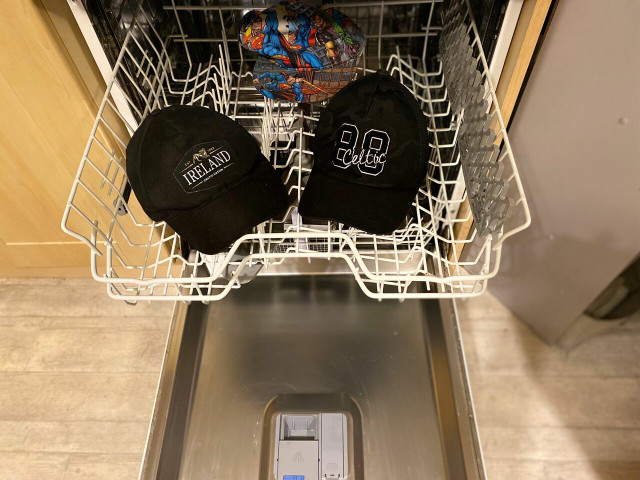 Wash hats on the upper rack of your dishwasher.