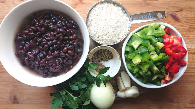 Black beans and their liquid and the ever-present green bell pepper, onion and garlic give the vegan congri rice a lot of its distinct Cuban flavor.